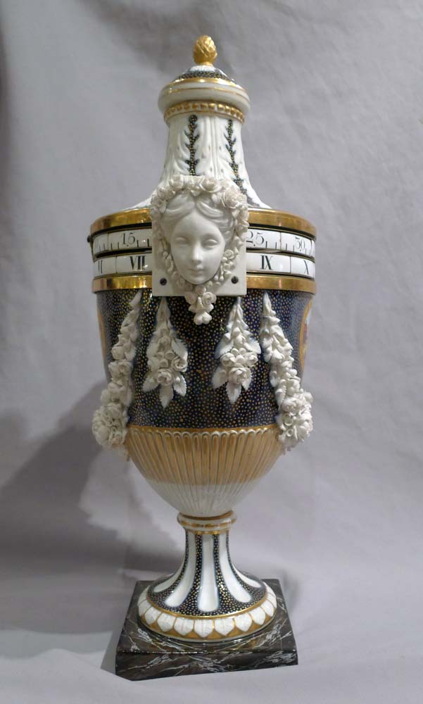 Exquisite French porcelain circe de tonneau clock.