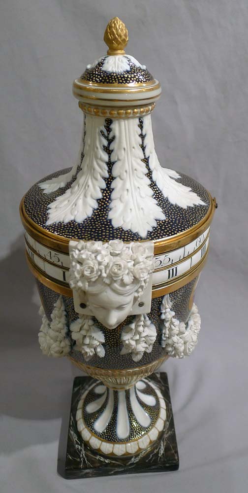 Exquisite French porcelain circe de tonneau clock.