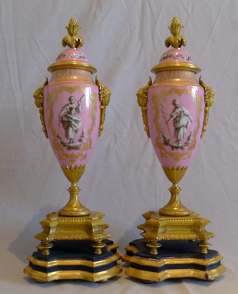 Antique French porcelain and ormolu clock set.