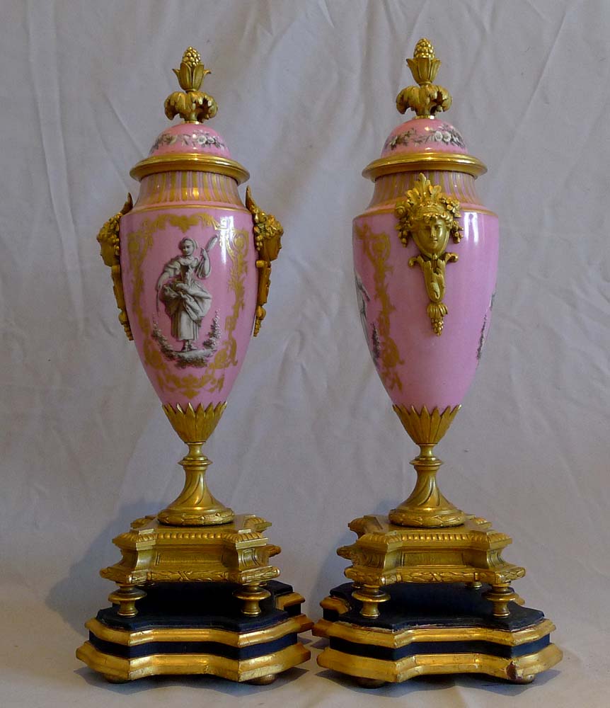 Antique French porcelain and ormolu clock set.