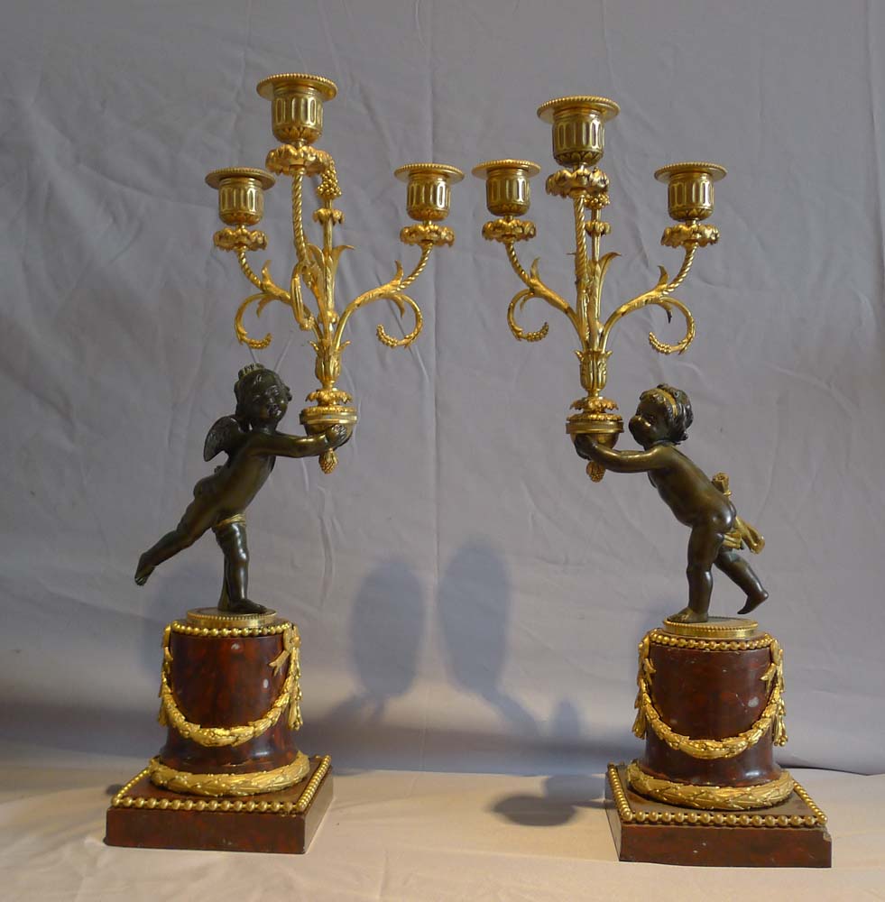 Antique French rouge marble and ormolu clock set with diial signed Julian Leroy a Paris.