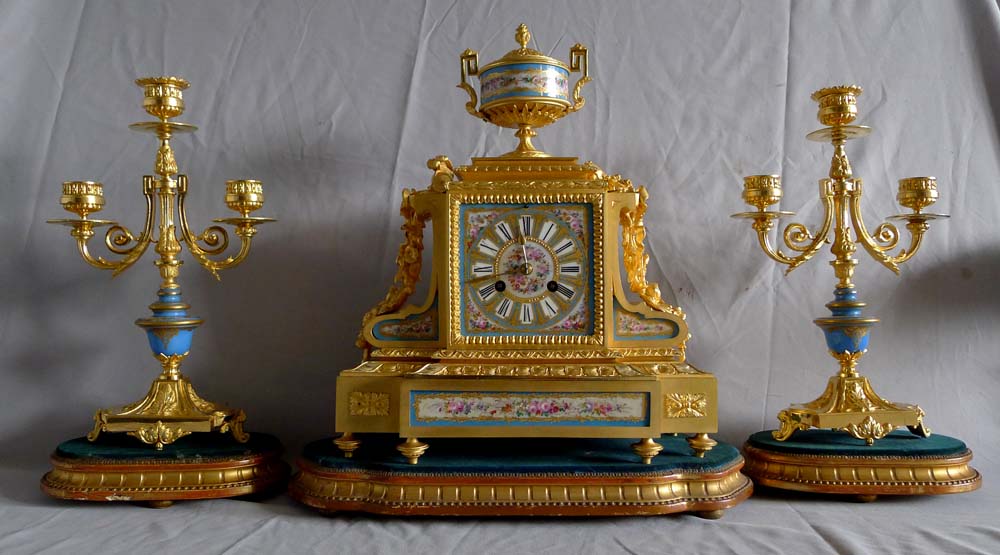 Antique French Napoleon III porcelain, ormolu and silvered bronze clock set.