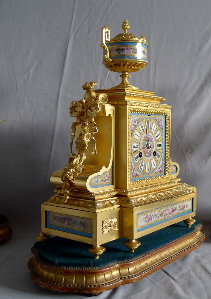 Antique French Napoleon III porcelain, ormolu and silvered bronze clock set.