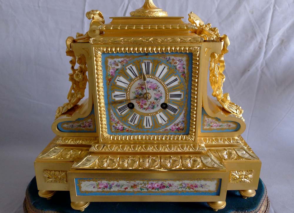 Antique French Napoleon III porcelain, ormolu and silvered bronze clock set.