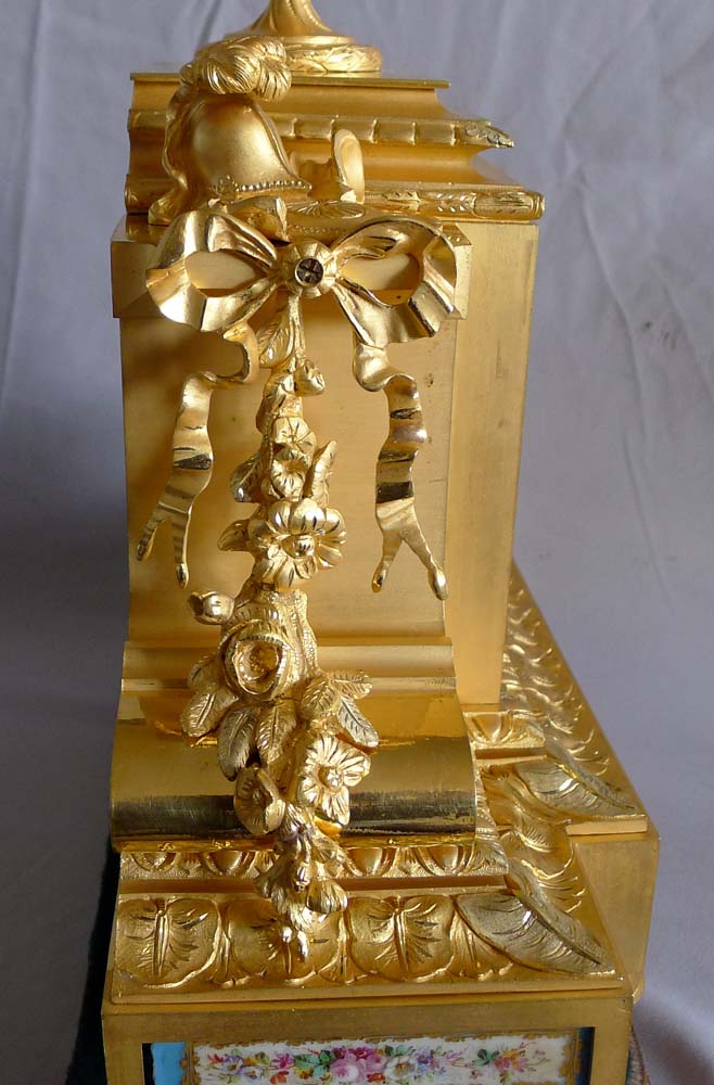 Antique French Napoleon III porcelain, ormolu and silvered bronze clock set.