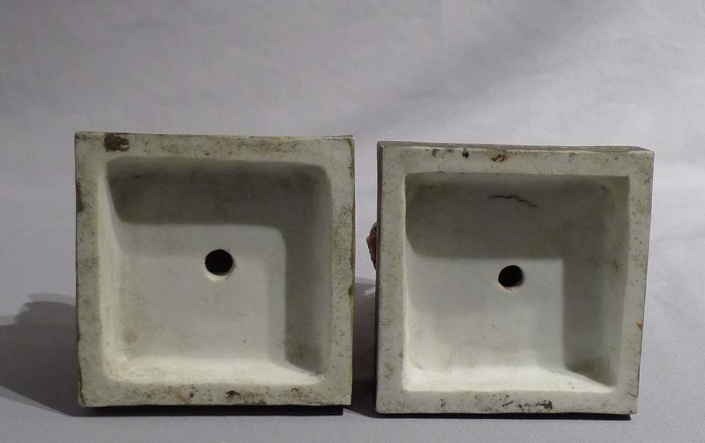 Antique French chinnoiserie pair or porcelain seated figures.