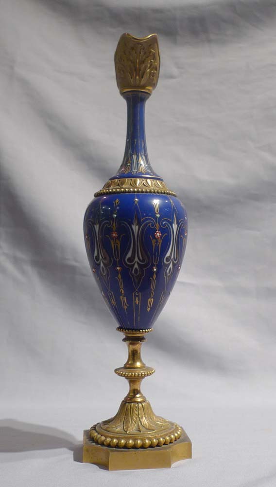 Antique French pair jewelled porcelain and ormolu ewers.
