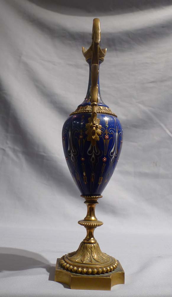 Antique French pair jewelled porcelain and ormolu ewers.