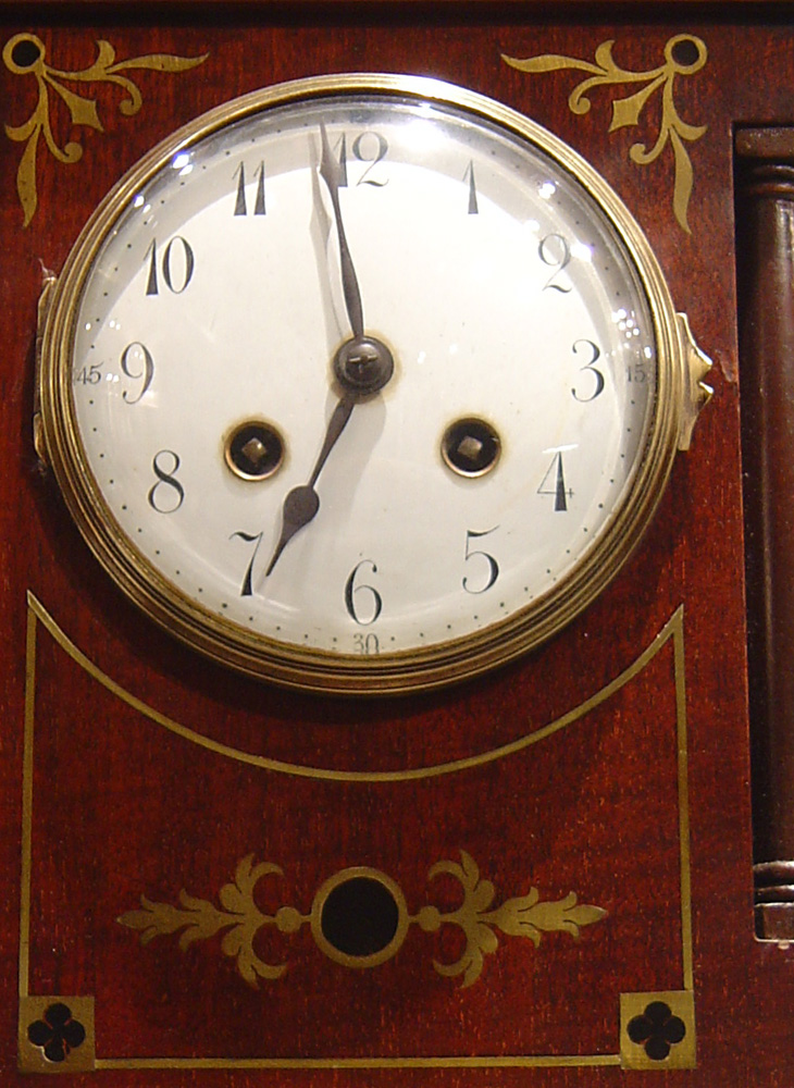 English Edwardian mahogany mantel clock.