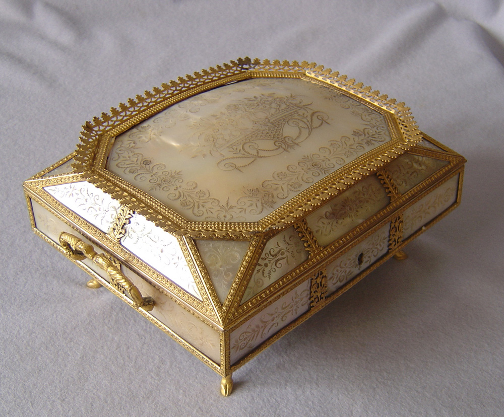 Antique grand tour Palais Royale music box and necessaire in mother of pearl and gilt bronze.