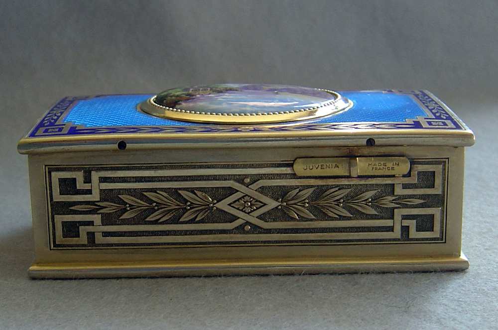 Fine French singing bird box by Juvinia in silver gilt and sky blue guilloche enamel.