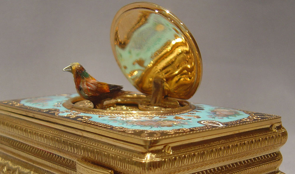 Singing bird automaton musical box in gilt bronze and enamel.
