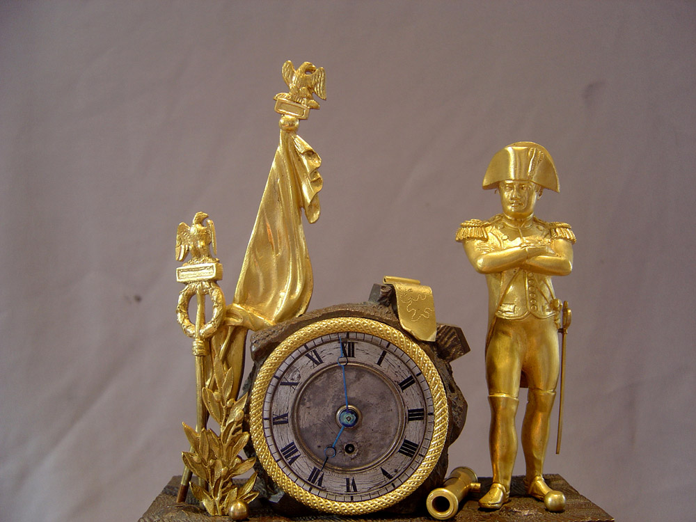 Napoleon Empire Egyptian theme mantel clock with musical movement signed Alibert.