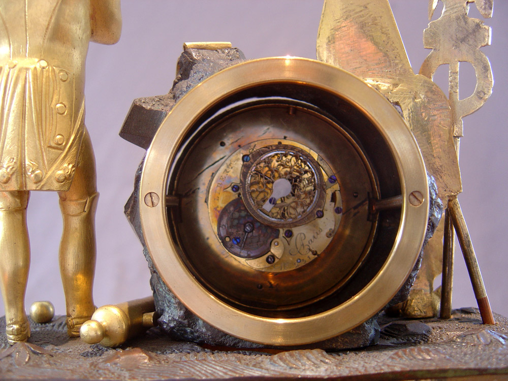 Napoleon Empire Egyptian theme mantel clock with musical movement signed Alibert.