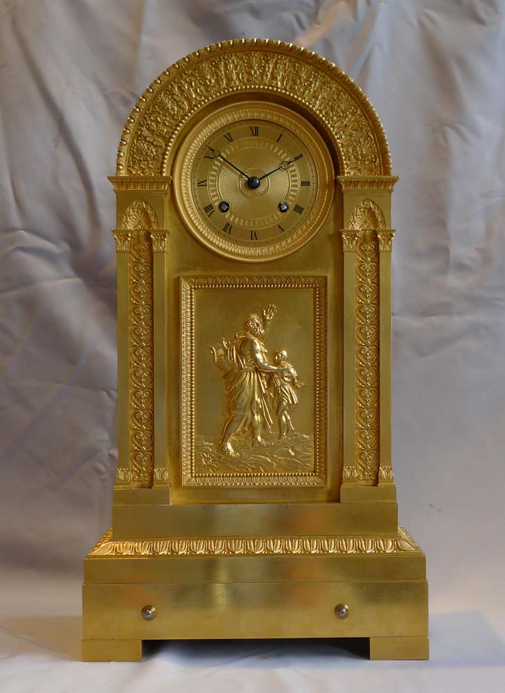 French Empire antique ormolu mantel clock with musical movement.