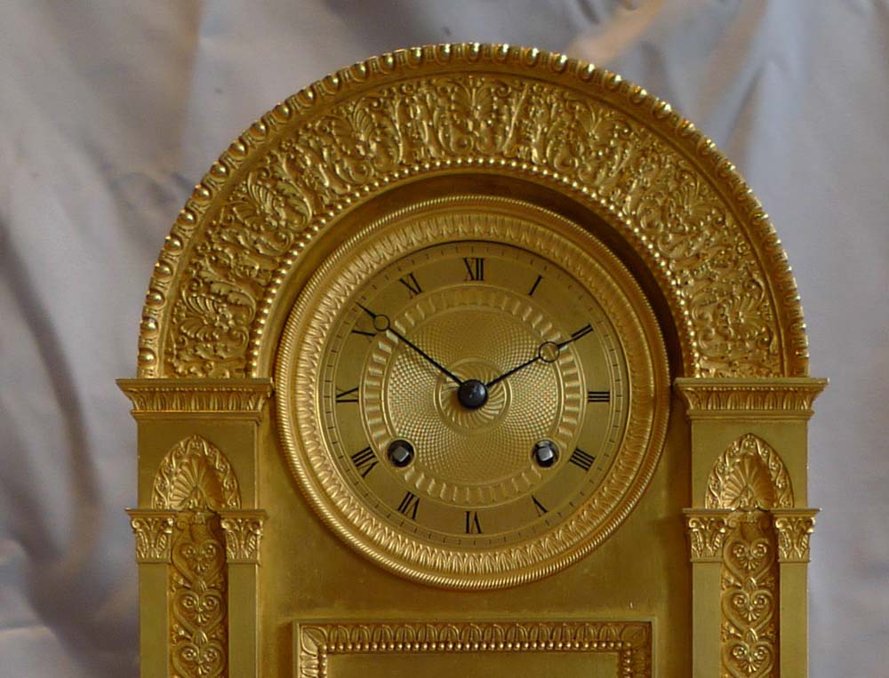 French Empire antique ormolu mantel clock with musical movement.