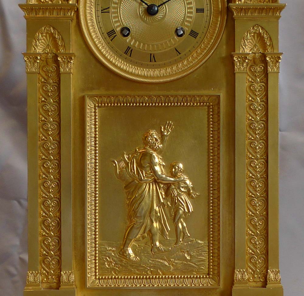 French Empire antique ormolu mantel clock with musical movement.