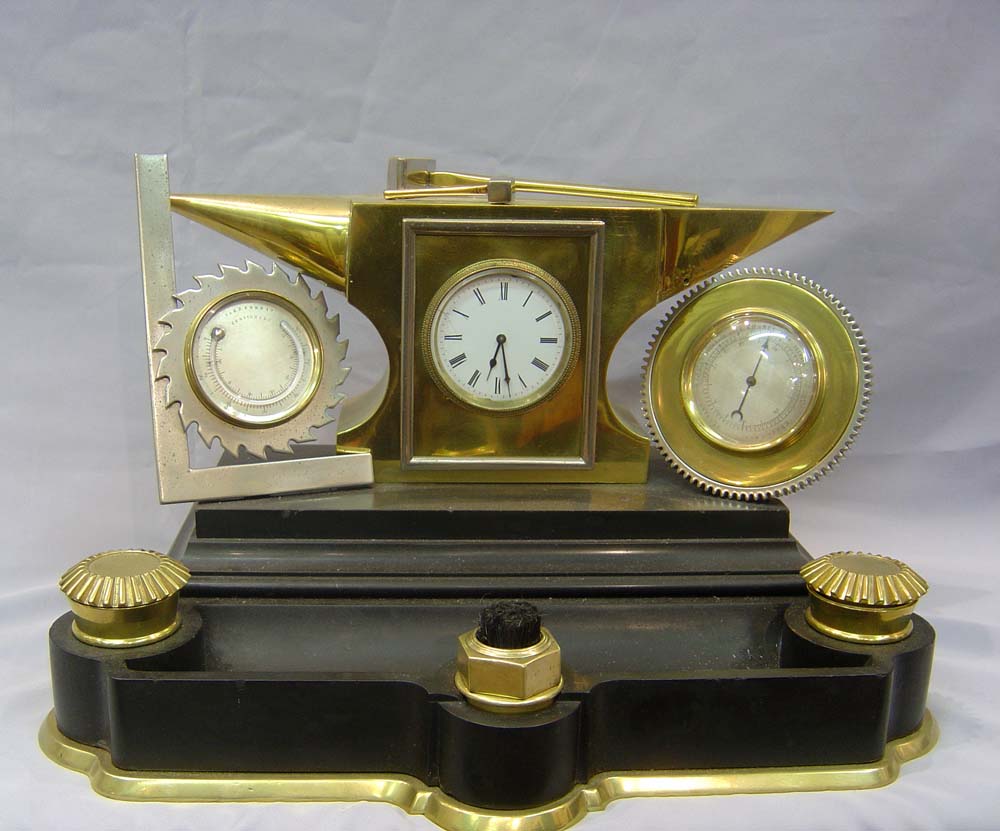 Antique industrial clock desk compendium, French in form of anvil and tools.
