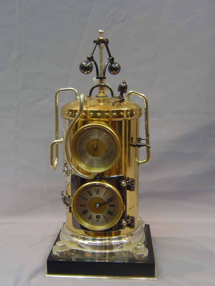 Antique industrial clock and automaton, French in form of a steam boiler.