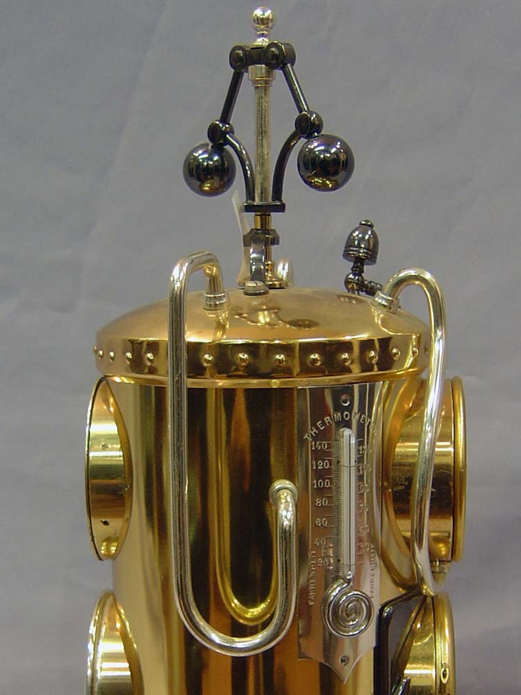 Antique industrial clock and automaton, French in form of a steam boiler.