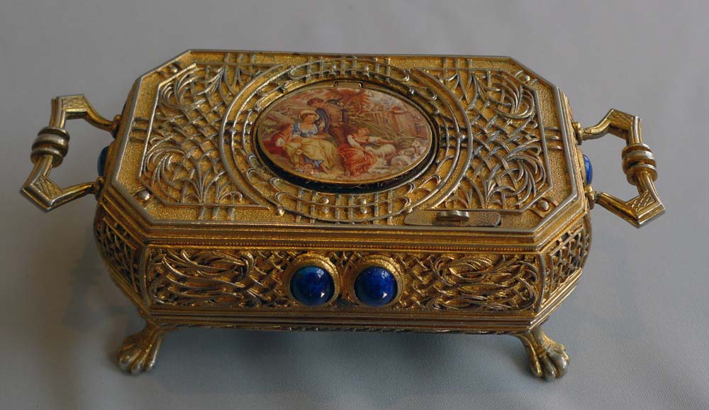 Singing bird box automaton in gilt bronze, jewelled case with miniature to lid.