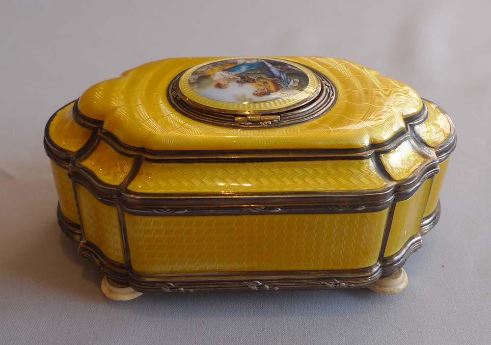 French singing bird box in silver and imperial yellow guilloche enamel