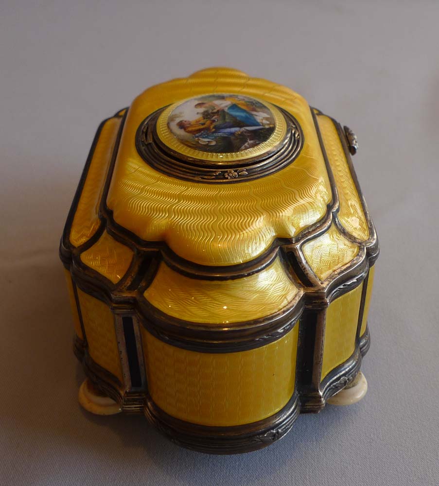 French singing bird box in silver and imperial yellow guilloche enamel
