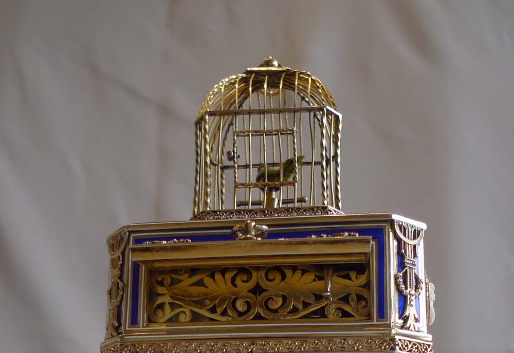 Rare singing bird box in silver gilt, iridescent blue guilloche enamel and ivory.