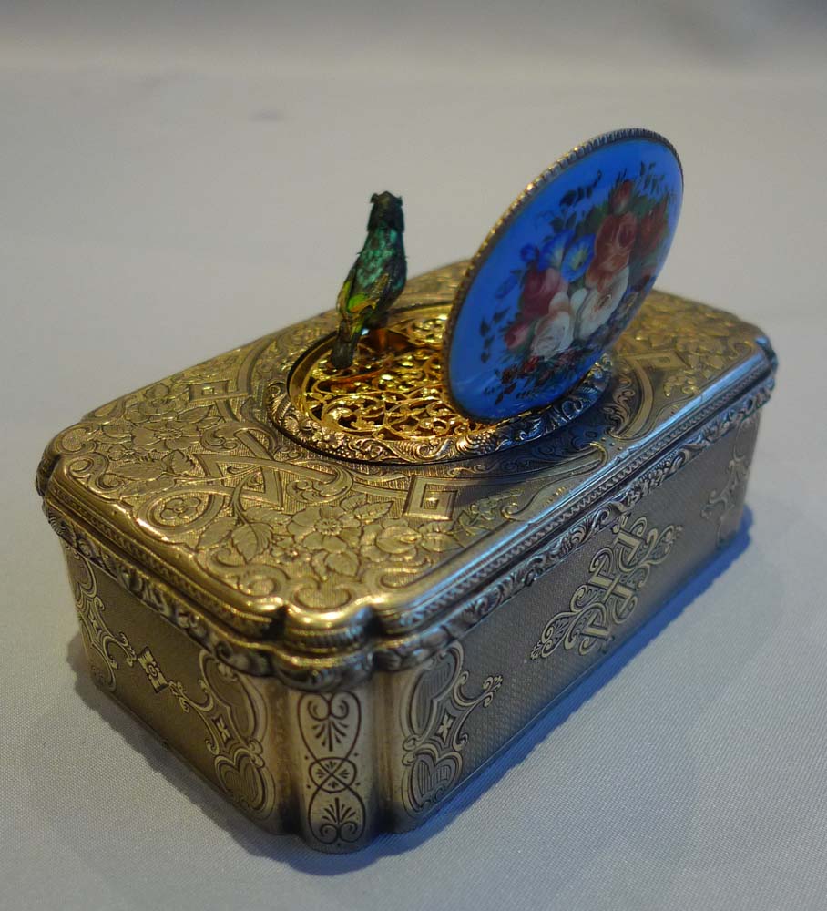 Bruguier fusee singing bird box in silver gilt and enamel in original leather case.