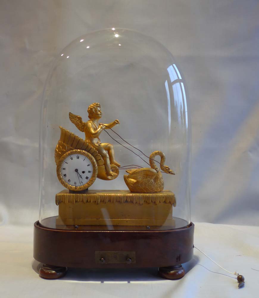 French Empire miniature ormolu clock with two tune musical base.