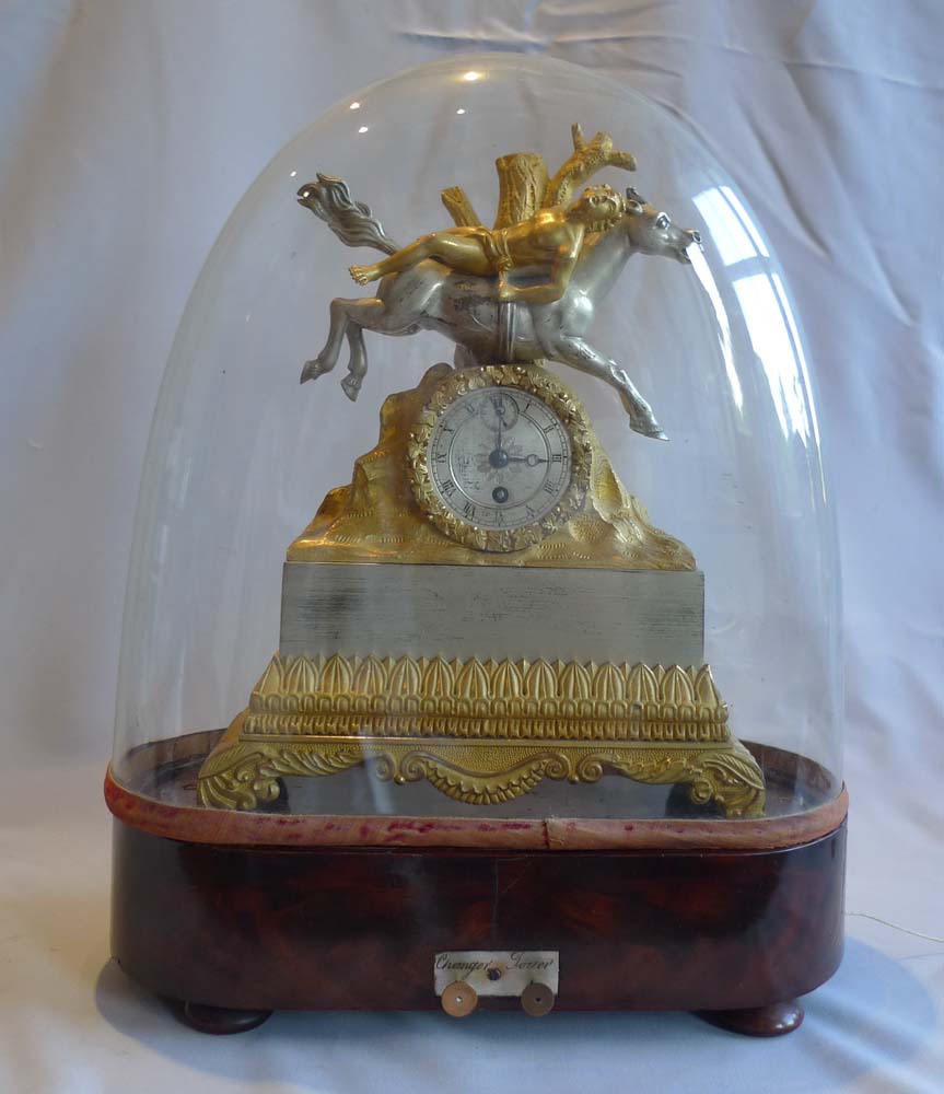Charles X silvered bronze and ormolu miniature mantel clock on musical base.