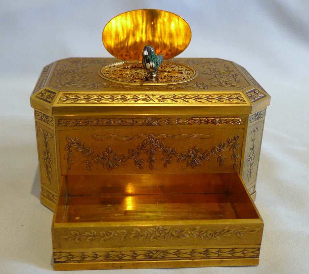 Antique singing bird box finely engraved with mechanically opening drawer, Bontems France.