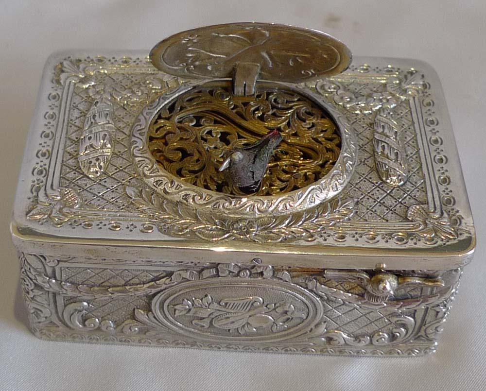 Singing bird box by Griesbaum in fitted case with original key.