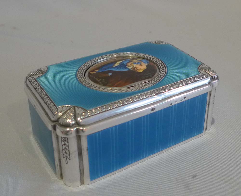 Singing bird box in solid silver and all over electric blue guilloche enamel with watch by Raymys.