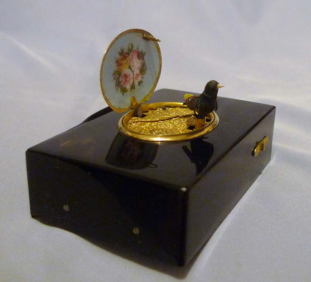 Antique singing bird box by Rochat in tortoiseshell , enamel and silver gilt.