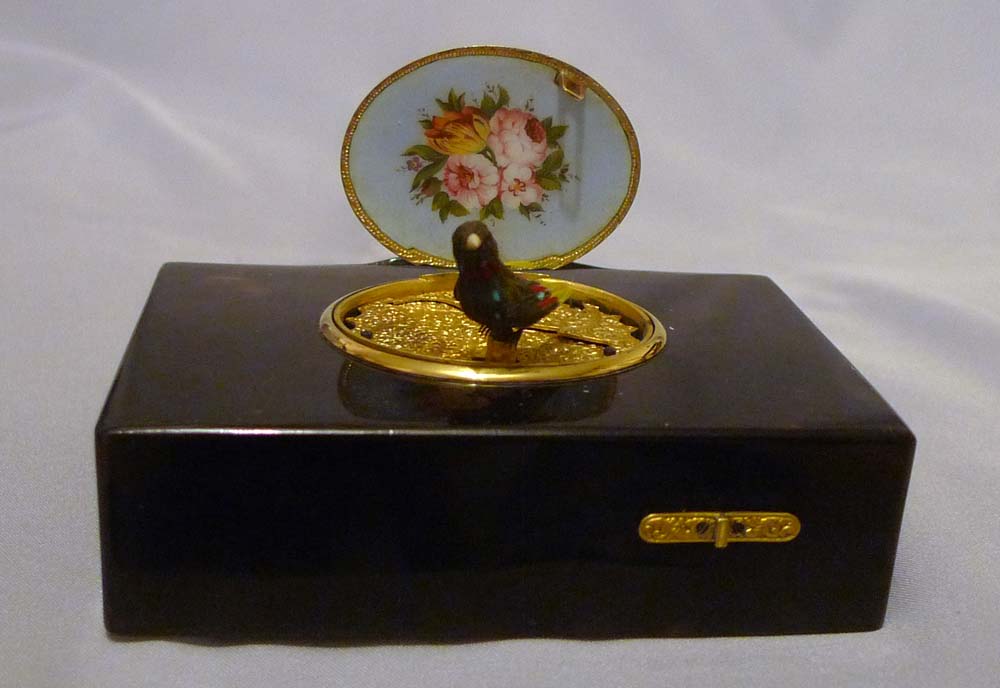 Antique singing bird box by Rochat in tortoiseshell , enamel and silver gilt.