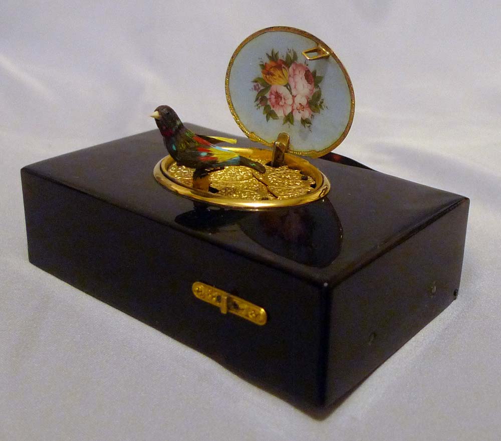 Antique singing bird box by Rochat in tortoiseshell , enamel and silver gilt.