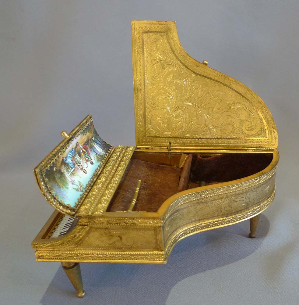 Antique musical grand piano in hand painted enamel and fine gilt bronze.
