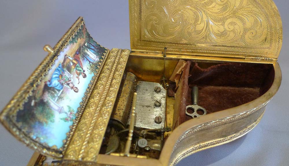 Antique musical grand piano in hand painted enamel and fine gilt bronze.