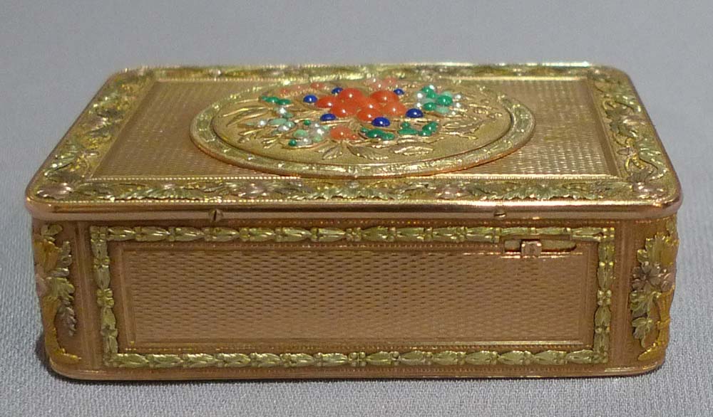Antique singing bird box by Rochat in four colour gold and hardstone decoration