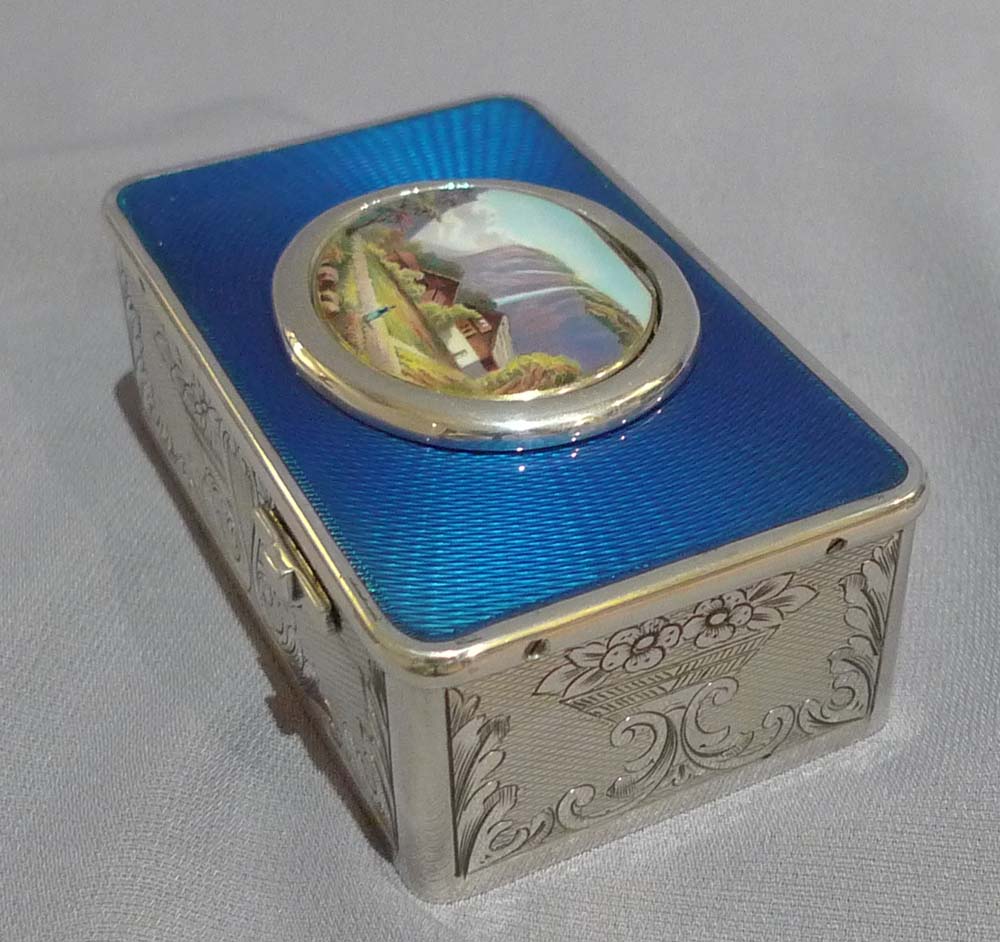 Singing bird box in silver and blue guilloche enamel, movement by Salmon.