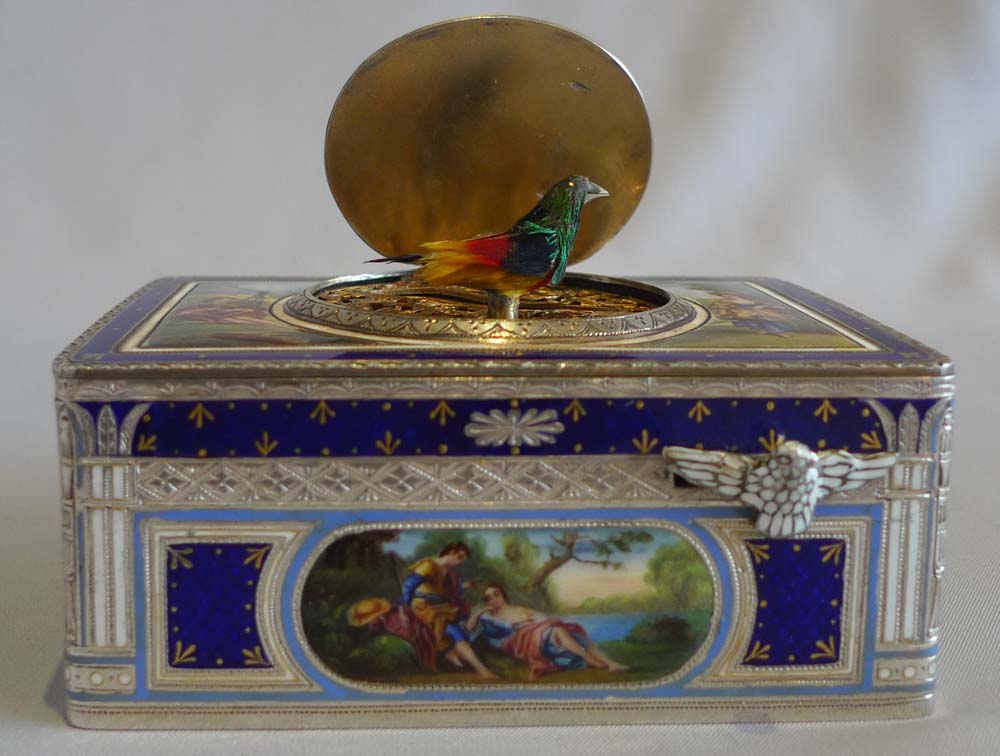 Singing bird box in silver and fine hand painted and guilloche enamel .