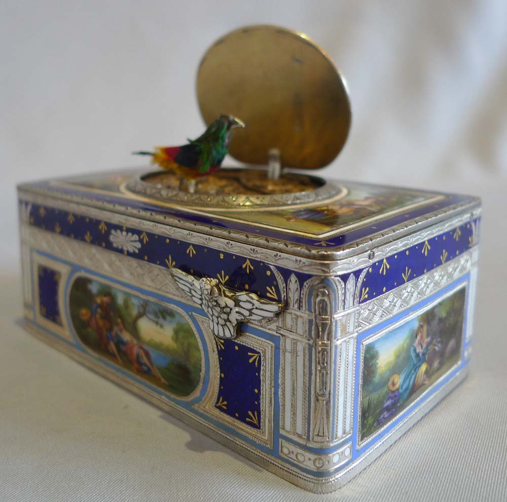 Singing bird box in silver and fine hand painted and guilloche enamel .