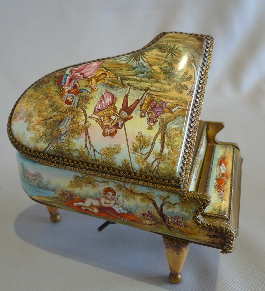Musical piano in gilt bronze and hand painted enamel.