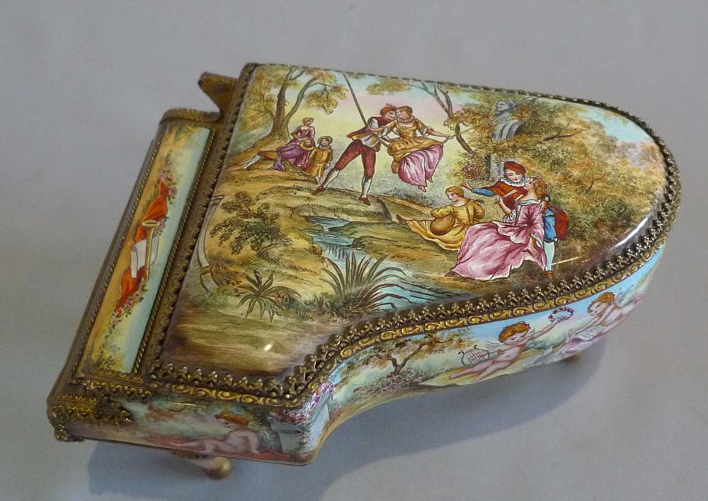 Musical piano in gilt bronze and hand painted enamel.