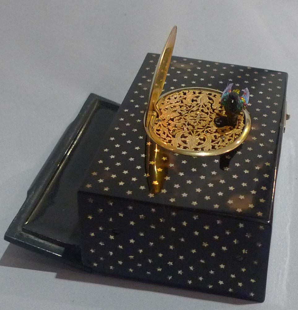 Antique Bontems gold star inlaid tortoiseshell singing bird box in original case.