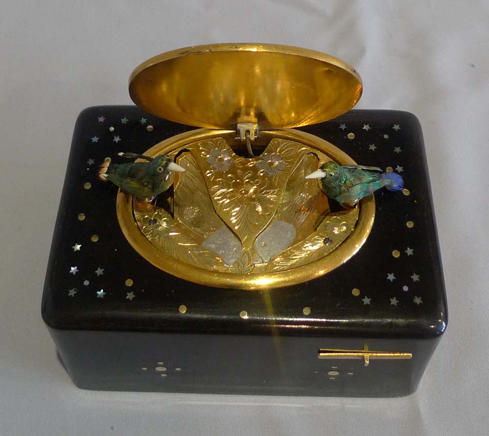 Antique double singing bird box automaton, side wound bois durci with original outer case.