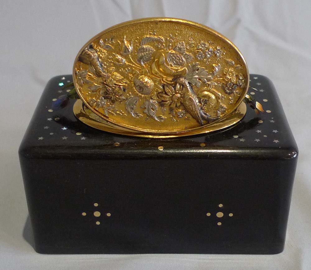 Antique double singing bird box automaton, side wound bois durci with original outer case.