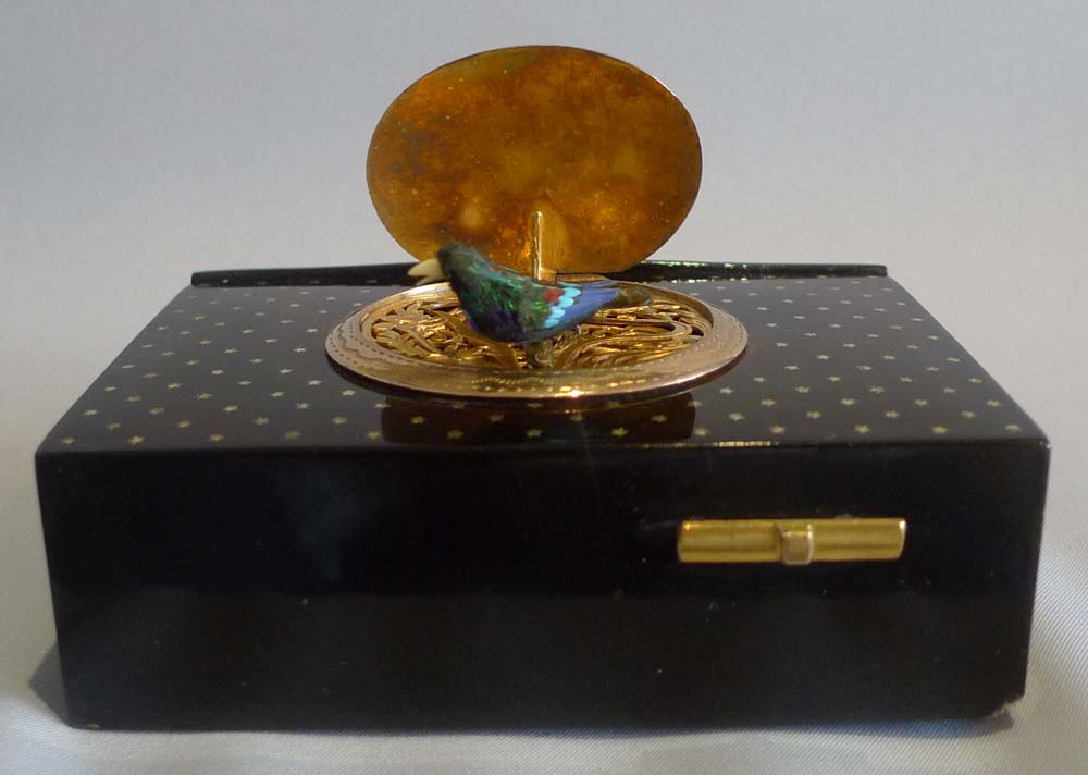 Antique singing bird box by Bontems in tortoiseshell and silver gilt with original case and key.