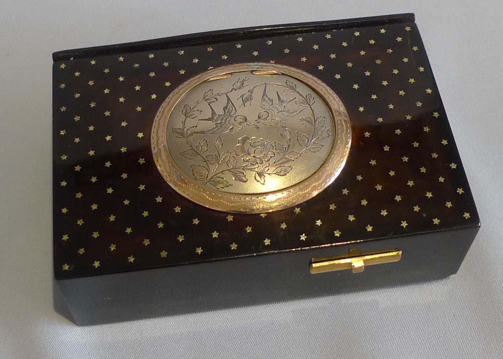 Antique singing bird box by Bontems in tortoiseshell and silver gilt with original case and key.